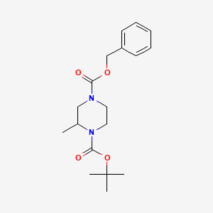 molecular formula C18H26N2O4 B7884952 4-苄基 1-叔丁基 2-甲基哌嗪-1,4-二羧酸酯 