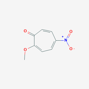 molecular formula C8H7NO4 B079105 2-Methoxy-5-nitrotropone CAS No. 14628-90-1