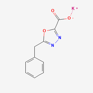 molecular formula C10H7KN2O3 B7911303 Potassium 5-benzyl-1,3,4-oxadiazole-2-carboxylate 