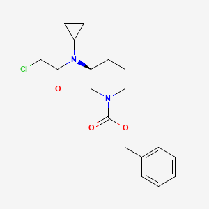 molecular formula C18H23ClN2O3 B7912709 (S)-3-[(2-Chloro-acetyl)-cyclopropyl-amino]-piperidine-1-carboxylic acid benzyl ester 