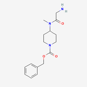 molecular formula C16H23N3O3 B7912778 4-[(2-Amino-acetyl)-methyl-amino]-piperidine-1-carboxylic acid benzyl ester 