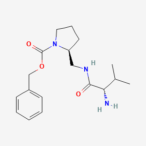 molecular formula C18H27N3O3 B7920117 (S)-2-[((S)-2-Amino-3-methyl-butyrylamino)-methyl]-pyrrolidine-1-carboxylic acid benzyl ester 