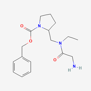 molecular formula C17H25N3O3 B7922362 2-{[(2-Amino-acetyl)-ethyl-amino]-methyl}-pyrrolidine-1-carboxylic acid benzyl ester 