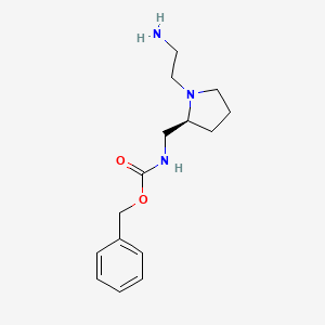 molecular formula C15H23N3O2 B7922848 [(S)-1-(2-Amino-ethyl)-pyrrolidin-2-ylmethyl]-carbamic acid benzyl ester 