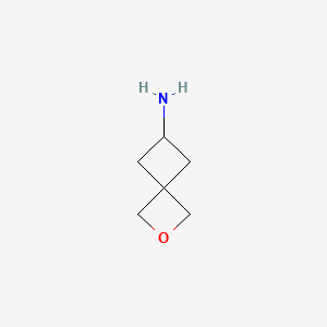 molecular formula C6H11NO B7968105 2-Oxaspiro[3.3]heptan-6-amine 