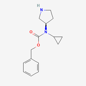 molecular formula C15H20N2O2 B7987149 Cyclopropyl-(R)-pyrrolidin-3-yl-carbamic acid benzyl ester 