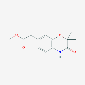 molecular formula C13H15NO4 B8008942 Methyl 2-(2,2-dimethyl-3-oxo-3,4-dihydro-2H-benzo[b][1,4]oxazin-7-yl)acetate 