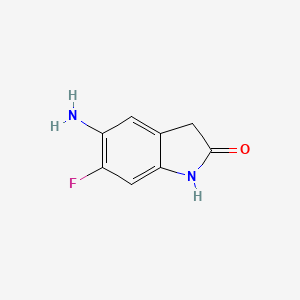 molecular formula C8H7FN2O B8012617 5-Amino-6-fluoro-1,3-dihydro-indol-2-one 