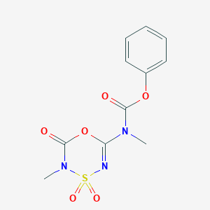 molecular formula C11H11N3O6S B8040316 phenyl N-methyl-N-(5-methyl-4,4,6-trioxo-1,4,3,5-oxathiadiazin-2-yl)carbamate 