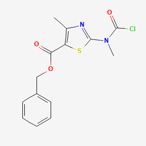 molecular formula C14H13ClN2O3S B8044464 Benzyl 2-[carbonochloridoyl(methyl)amino]-4-methyl-1,3-thiazole-5-carboxylate 