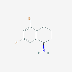 (R)-5,7-Dibromo-1,2,3,4-tetrahydronaphthalen-1-amine