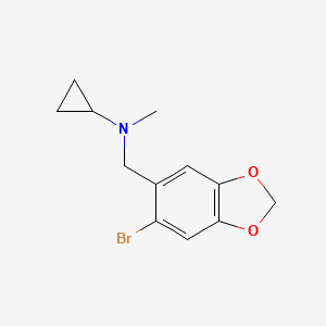 molecular formula C12H14BrNO2 B8056919 N-[(6-bromo-1,3-dioxaindan-5-yl)methyl]-N-methylcyclopropanamine 