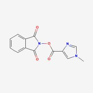 molecular formula C13H9N3O4 B8074488 1,3-dioxo-2,3-dihydro-1H-isoindol-2-yl 1-methyl-1H-imidazole-4-carboxylate 