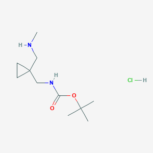 molecular formula C11H23ClN2O2 B8086087 tert-Butyl ({1-[(methylamino)methyl]cyclopropyl}methyl)carbamate hydrochloride 