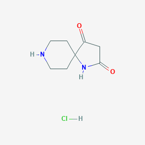 molecular formula C8H13ClN2O2 B8092914 1,8-Diazaspiro[4.5]decane-2,4-dione hydrochloride 