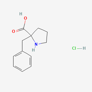molecular formula C12H16ClNO2 B8097662 2-(Phenylmethyl)-DL-proline HCl 