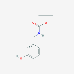 molecular formula C13H19NO3 B8100713 tert-butylN-[(3-hydroxy-4-methylphenyl)methyl]carbamate 