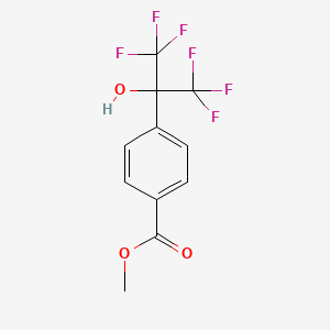 molecular formula C11H8F6O3 B8118449 Methyl 4-[2,2,2-trifluoro-1-hydroxy-1-(trifluoromethyl)ethyl]benzoate 