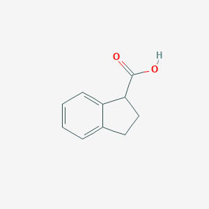 molecular formula C10H10O2 B081199 2,3-Dihydro-1H-indene-1-carboxylic acid CAS No. 14381-42-1