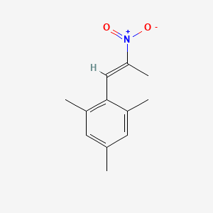 molecular formula C12H15NO2 B8120630 1,3,5-trimethyl-2-[(E)-2-nitroprop-1-enyl]benzene 