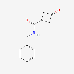 molecular formula C12H13NO2 B8123615 N-Benzyl-3-oxocyclobutanecarboxamide 