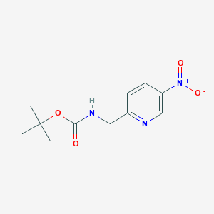 molecular formula C11H15N3O4 B8127444 tert-butyl N-[(5-nitropyridin-2-yl)methyl]carbamate 