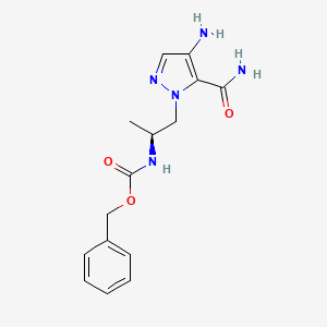 molecular formula C15H19N5O3 B8135898 (S)-Benzyl (1-(4-amino-5-carbamoyl-1H-pyrazol-1-yl)propan-2-yl)carbamate 
