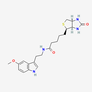molecular formula C21H28N4O3S B8144282 N-Biotinyl-5-methoxytryptamine 
