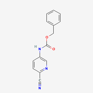 molecular formula C14H11N3O2 B8147619 benzyl N-(6-cyanopyridin-3-yl)carbamate 