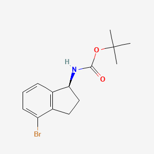 molecular formula C14H18BrNO2 B8148166 tert-Butyl (S)-(4-bromo-2,3-dihydro-1H-inden-1-yl)carbamate 
