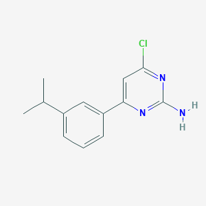 molecular formula C13H14ClN3 B8165574 4-Chloro-6-(3-isopropylphenyl)pyrimidin-2-amine 