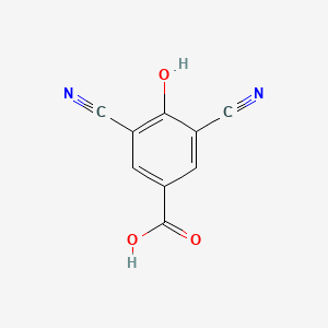 molecular formula C9H4N2O3 B8185446 3,5-Dicyano-4-hydroxybenzoic acid 