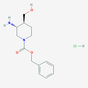 molecular formula C14H21ClN2O3 B8189817 trans-3-Amino-4-hydroxymethyl-piperidine-1-carboxylic acid benzyl ester hydrochloride 
