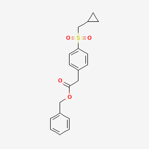 molecular formula C19H20O4S B8239772 Benzyl 2-[4-(cyclopropylmethylsulfonyl)phenyl]acetate 