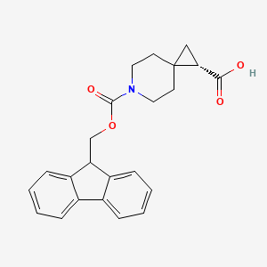 molecular formula C23H23NO4 B8257451 (S)-6-(((9H-fluoren-9-yl)methoxy)carbonyl)-6-azaspiro[2.5]octane-1-carboxylic acid 