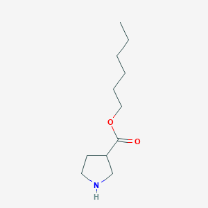 3-[(Hexyloxy)carbonyl]pyrrolidine