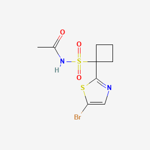 molecular formula C9H11BrN2O3S2 B8293578 N-{[1-(5-bromo-1,3-thiazol-2-yl)cyclobutyl]sulfonyl}acetamide 