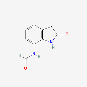 molecular formula C9H8N2O2 B8295756 N-(2-oxoindolin-7-yl)formamide 