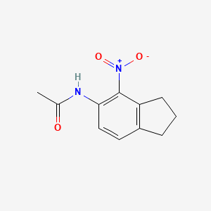 molecular formula C11H12N2O3 B8319255 N-(4-nitro-2,3-dihydro-1H-inden-5-yl)acetamide 