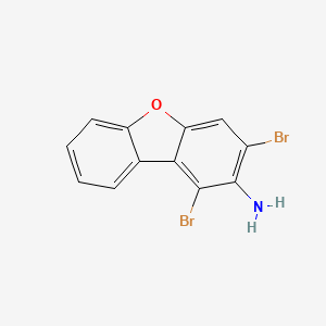 molecular formula C12H7Br2NO B8319407 1,3-Dibromo-dibenzofuran-2-ylamine 