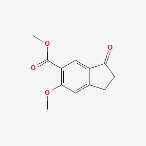 molecular formula C12H12O4 B8319470 6-Methoxy-3-oxo-indan-5-carboxylic acid methyl ester 