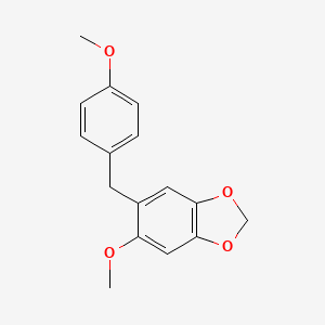 5-Methoxy-6-[(4-methoxyphenyl)methyl]-1,3-benzodioxole