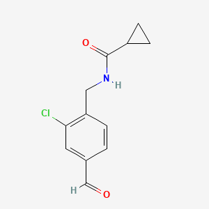 molecular formula C12H12ClNO2 B8341062 N-[(2-chloro-4-formylphenyl)methyl]cyclopropanecarboxamide 