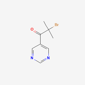 molecular formula C8H9BrN2O B8346604 2-Bromo-2-methyl-1-(pyrimidin-5-yl)propan-1-one 