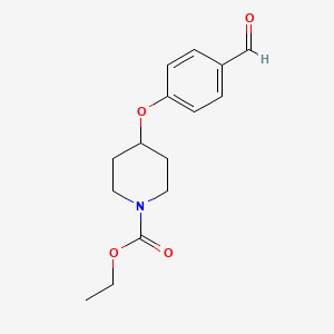 molecular formula C15H19NO4 B8376628 4-[N-(Ethoxycarbonyl)-4-piperidinyloxy]benzaldehyde 