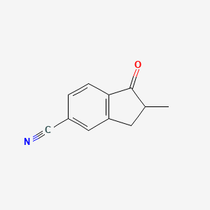 5-Cyano-2-methylindan-1-one