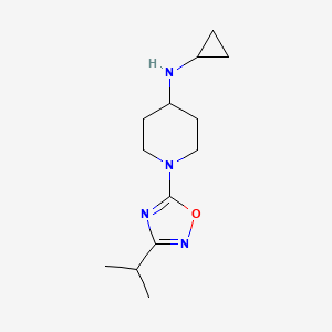 molecular formula C13H22N4O B8387413 Cyclopropyl-[1-(3-isopropyl-[1,2,4]oxadiazol-5-yl)-piperidin-4-yl]-amine 