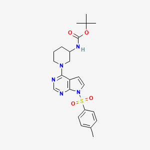 molecular formula C23H29N5O4S B8415383 tert-butyl 1-(7-tosyl-7H-pyrrolo[2,3-d]pyrimidin-4-yl)piperidin-3-ylcarbamate 