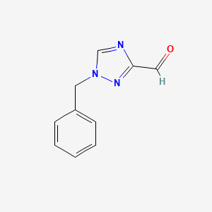 molecular formula C10H9N3O B8416654 1-Benzyl-3-formyl-1,2,4-triazole 