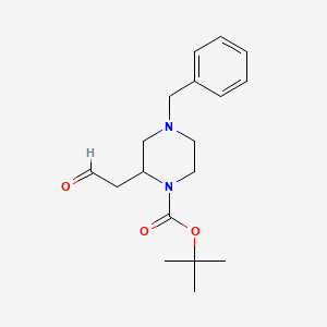 Tert-butyl 4-benzyl-2-(2-oxoethyl)piperazine-1-carboxylate